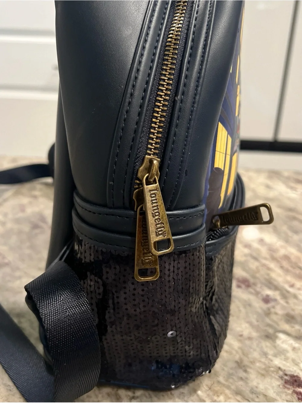 Black Mini Loungefly Backpack with Diagon Alley Illustration
